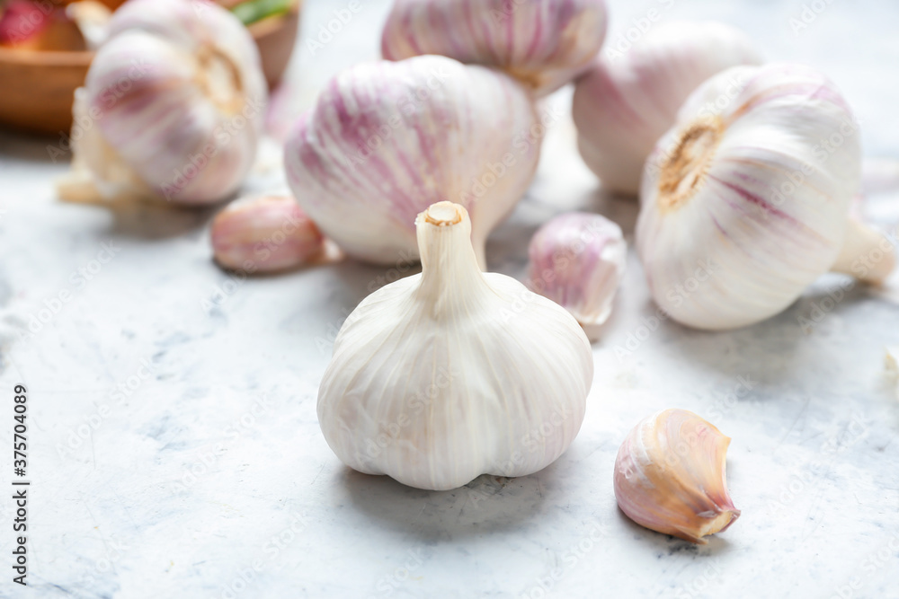 Fresh garlic on light background