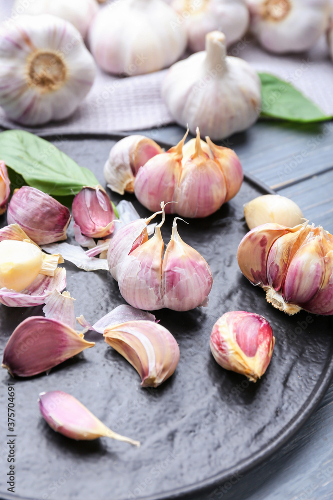 Fresh garlic on wooden background