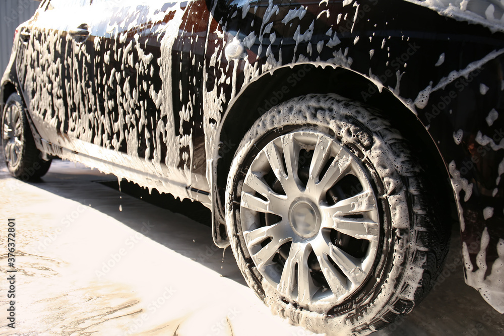 Modern automobile at car wash, closeup