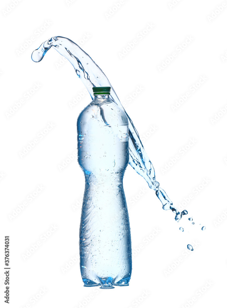 Bottle and splash of water on white background