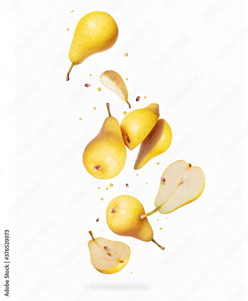 Whole and sliced ​​fresh pears in the air isolated on a white background