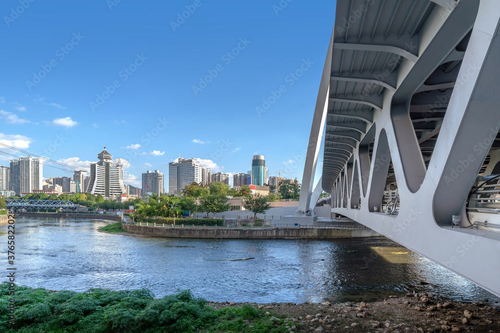 Modern tall buildings and bridge, Guiyang city landscape, China.