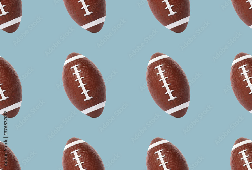 Many rugby balls on color background