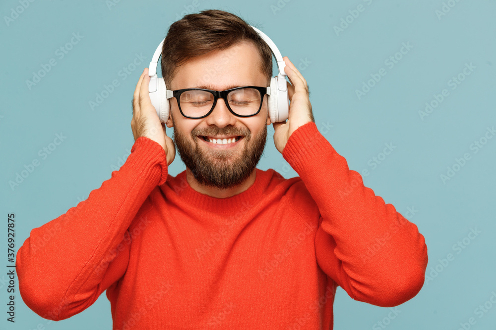 Happy man listening to music.