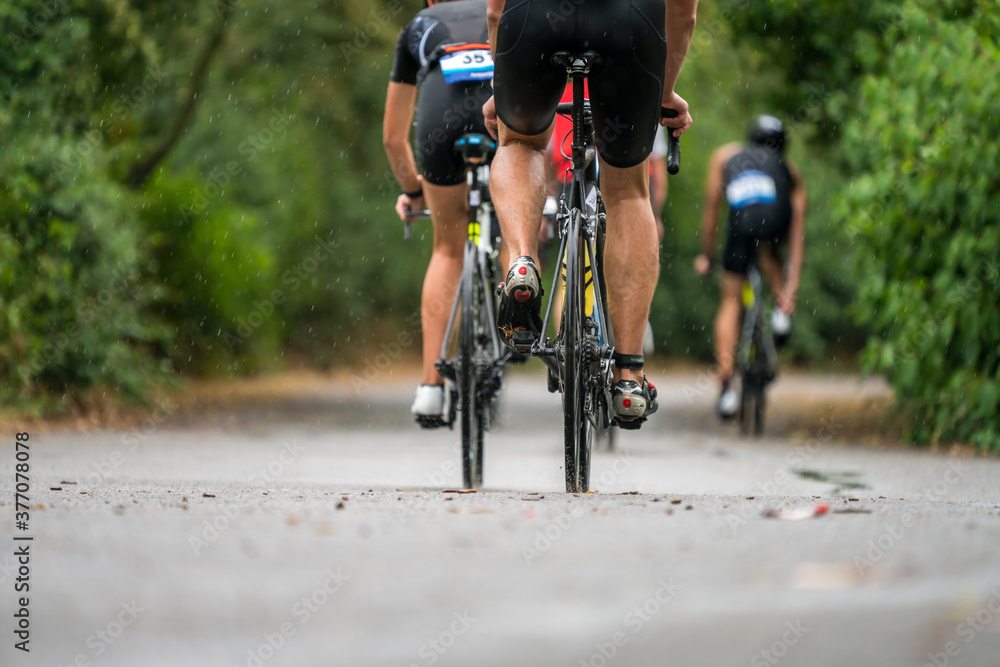 Triathletes cycling at a triathlon competition