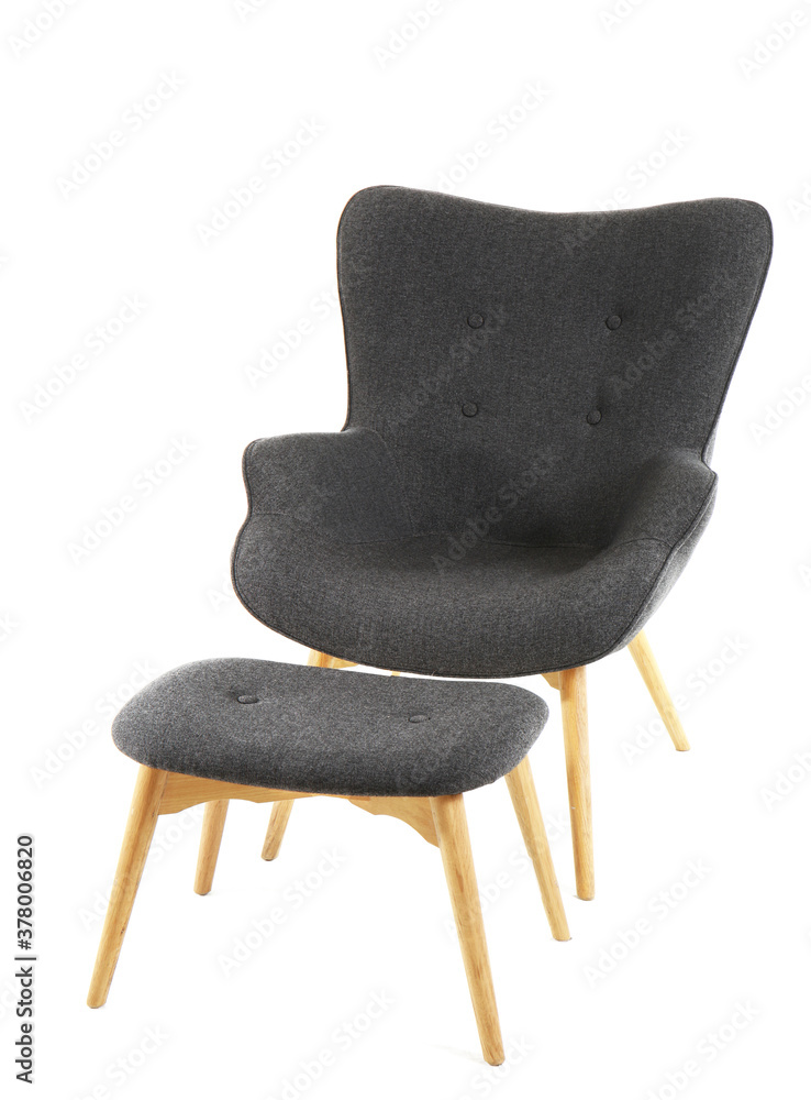 Stylish armchair and ottoman on white background