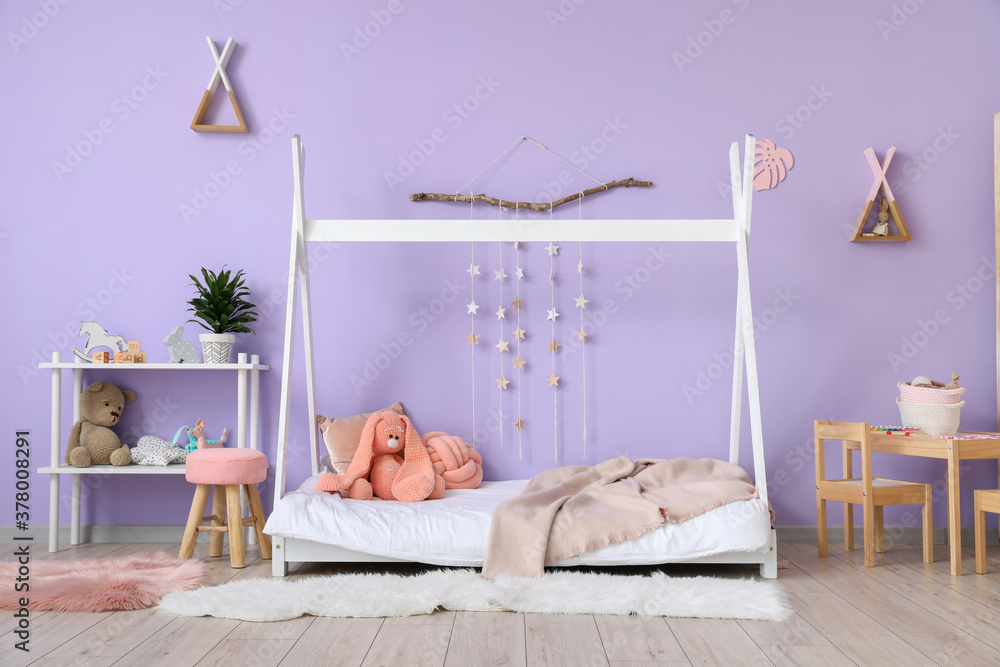 Interior of modern childrens room with comfortable bed