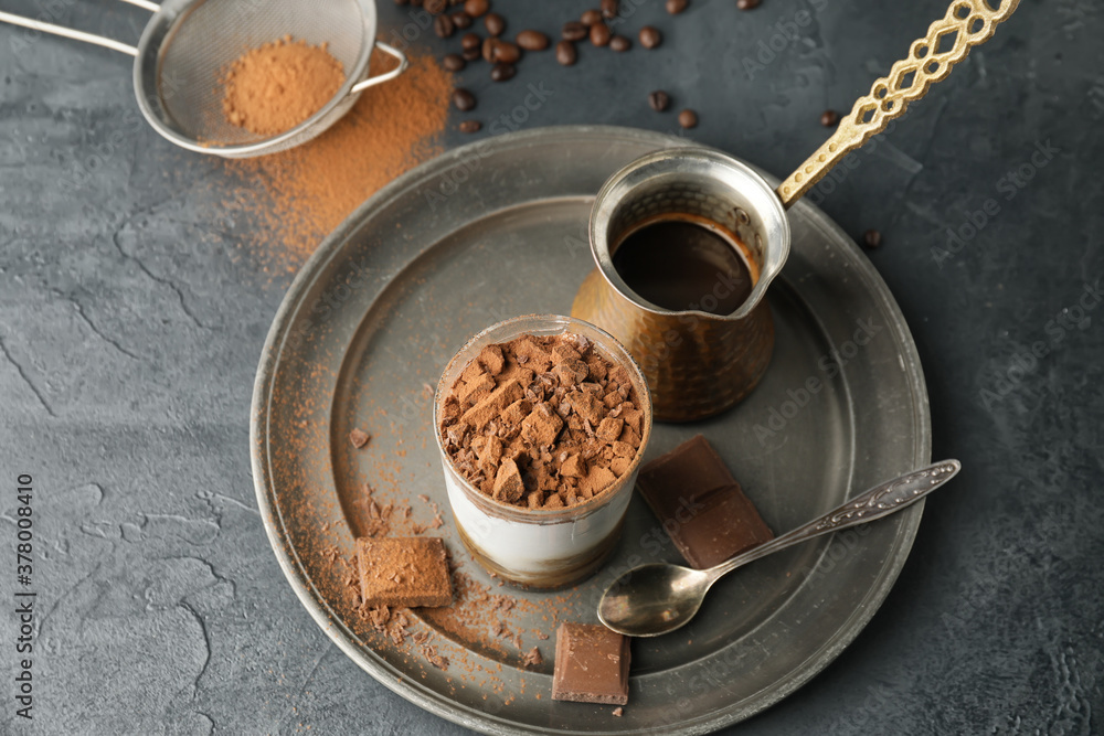 Composition with tasty tiramisu on table