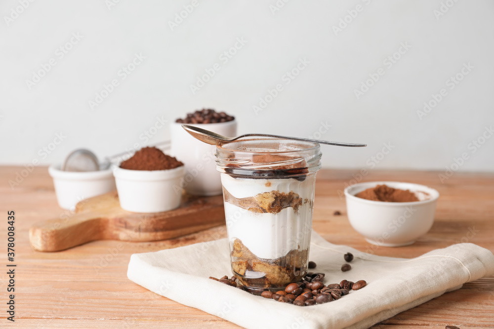 Composition with tasty tiramisu on table