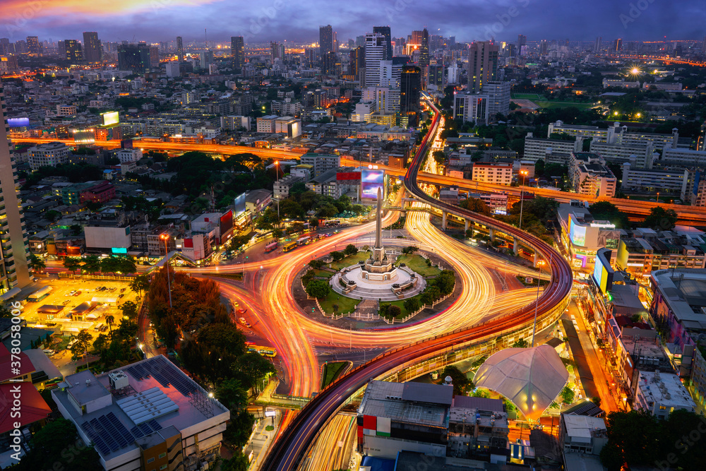 Victory monument Thailand in Bangkok city with sunset and building background