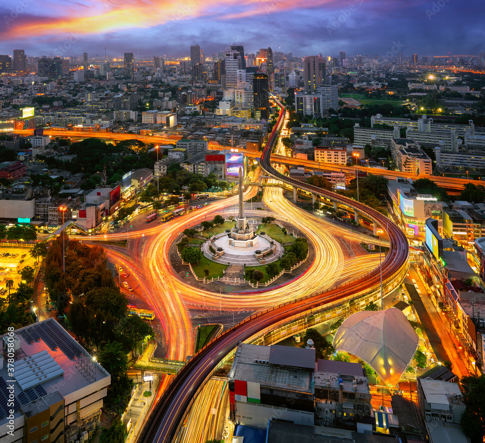 Victory monument Thailand in Bangkok city with sunset and building background