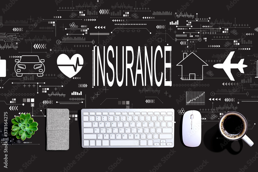 Insurance concept with a computer keyboard and a mouse