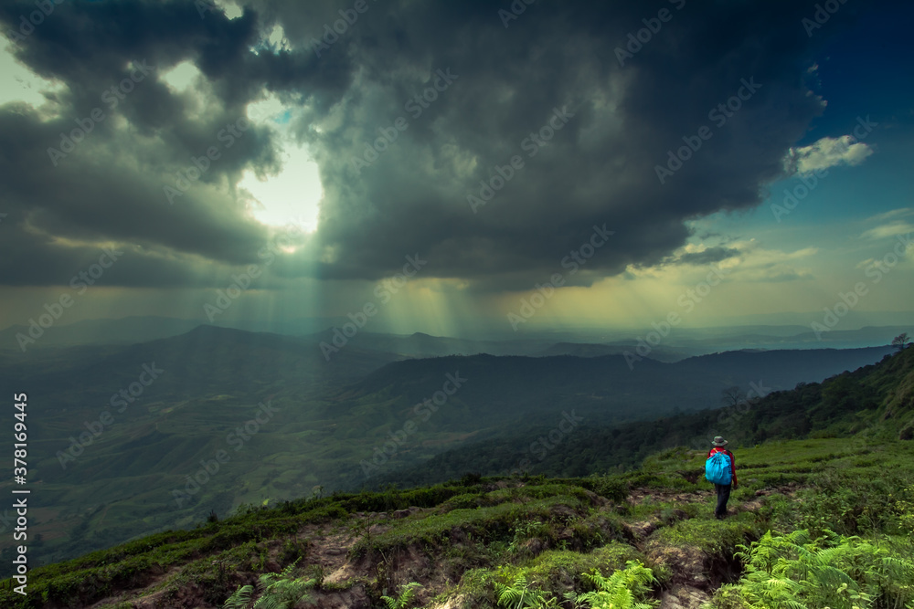 person walking in the mountains