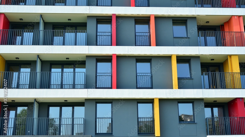 Contemporary residential building exterior in the daylight. Modern apartment buildings on a sunny da