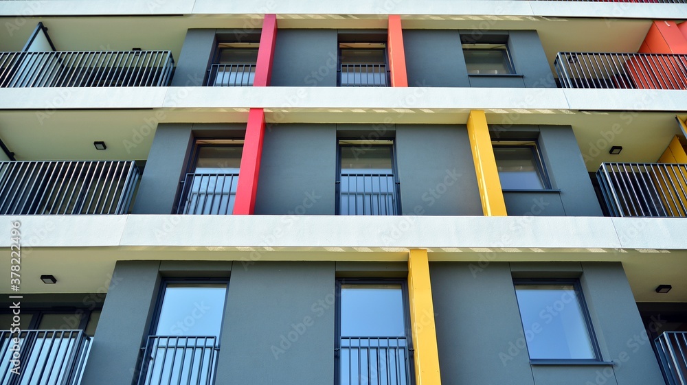 Contemporary residential building exterior in the daylight. Modern apartment buildings on a sunny da