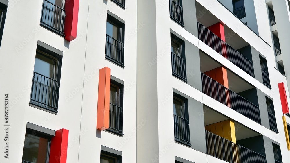 Contemporary residential building exterior in the daylight. Modern apartment buildings on a sunny da