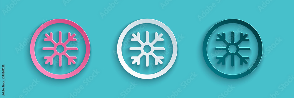 Paper cut Snowflake icon isolated on blue background. Paper art style. Vector.