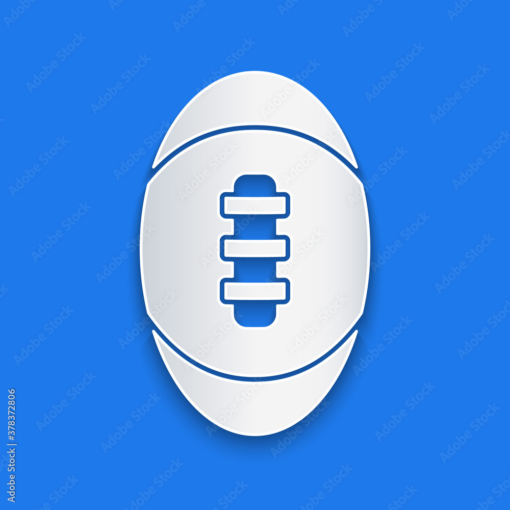 Paper cut American Football ball icon isolated on blue background. Rugby ball icon. Team sport game 