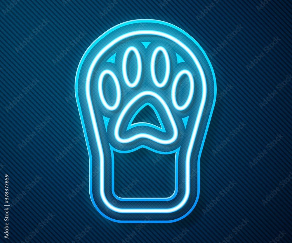 Glowing neon line Paw print icon isolated on blue background. Dog or cat paw print. Animal track. Ve