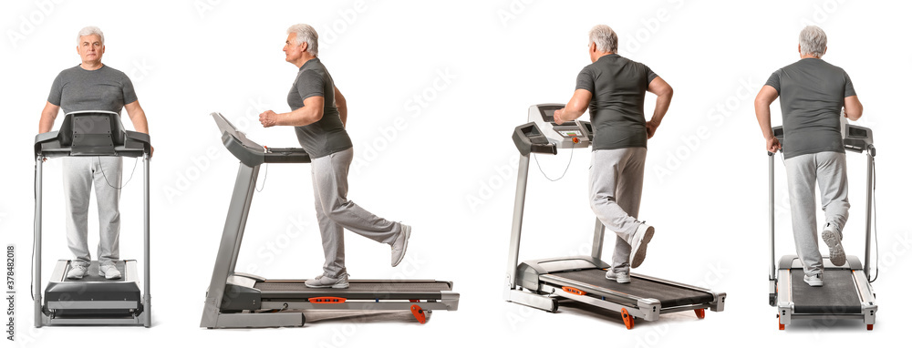 Senior man training on treadmill against white background