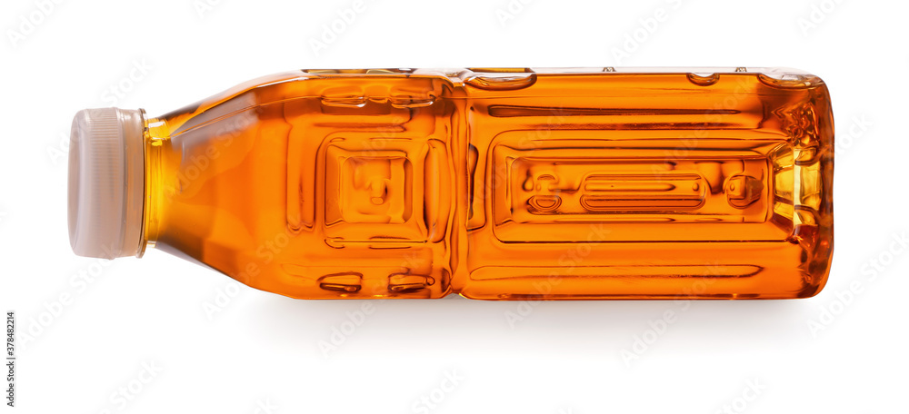 Bottle of fresh ice tea on white background