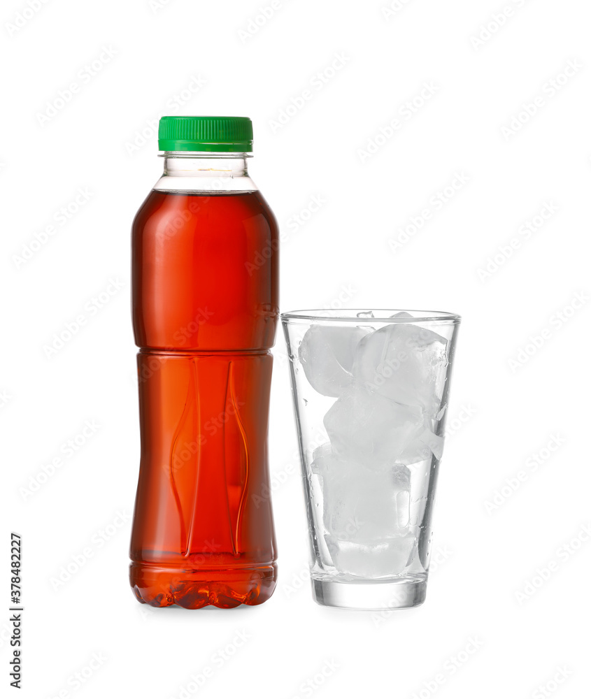 Bottle of fresh tea and glass with ice on white background