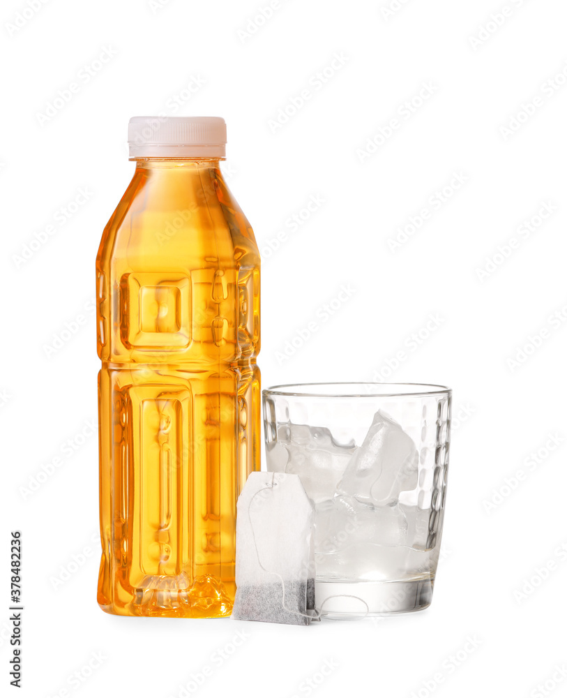 Bottle of fresh tea and glass with ice on white background