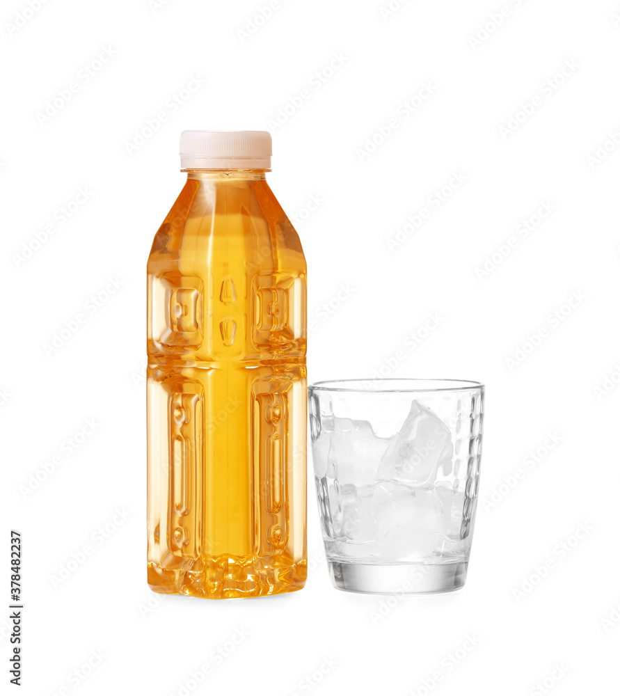 Bottle of fresh tea and glass with ice on white background