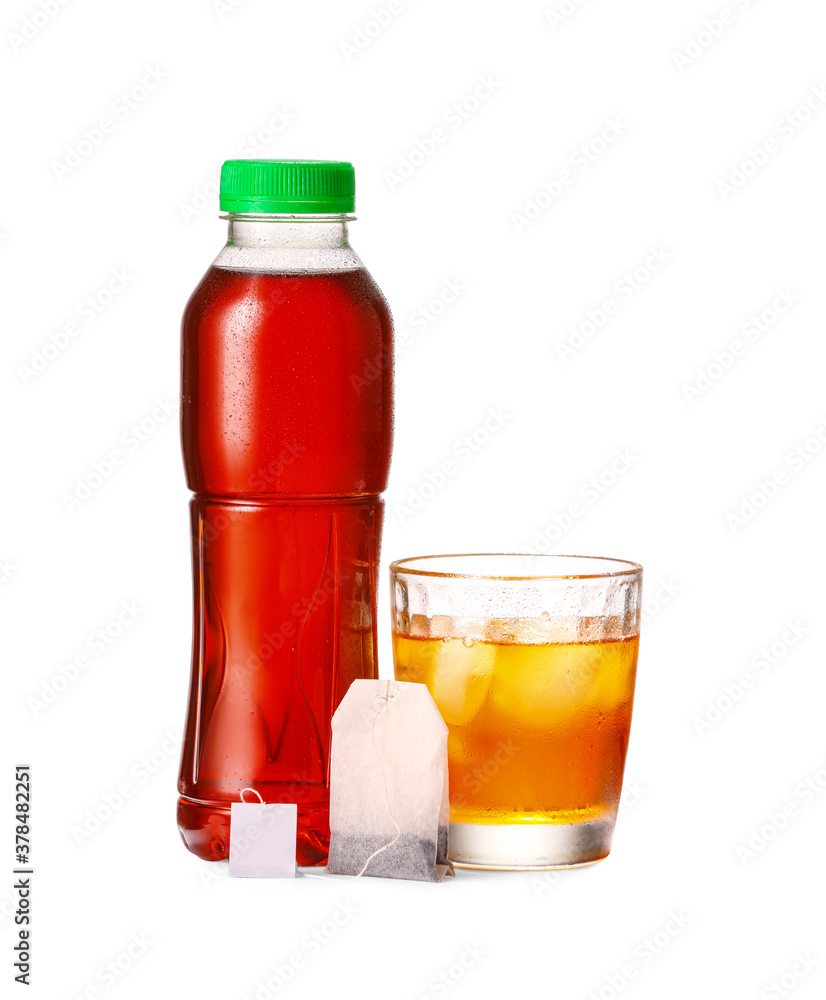 Bottle and glass of fresh ice tea on white background