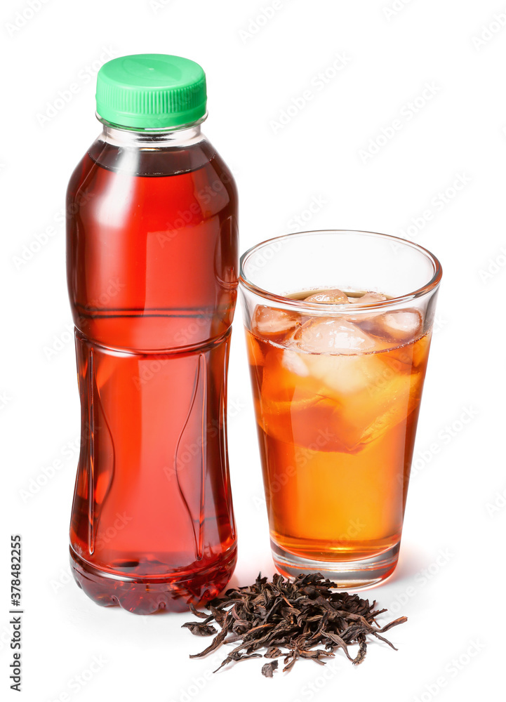 Bottle and glass of fresh ice tea on white background