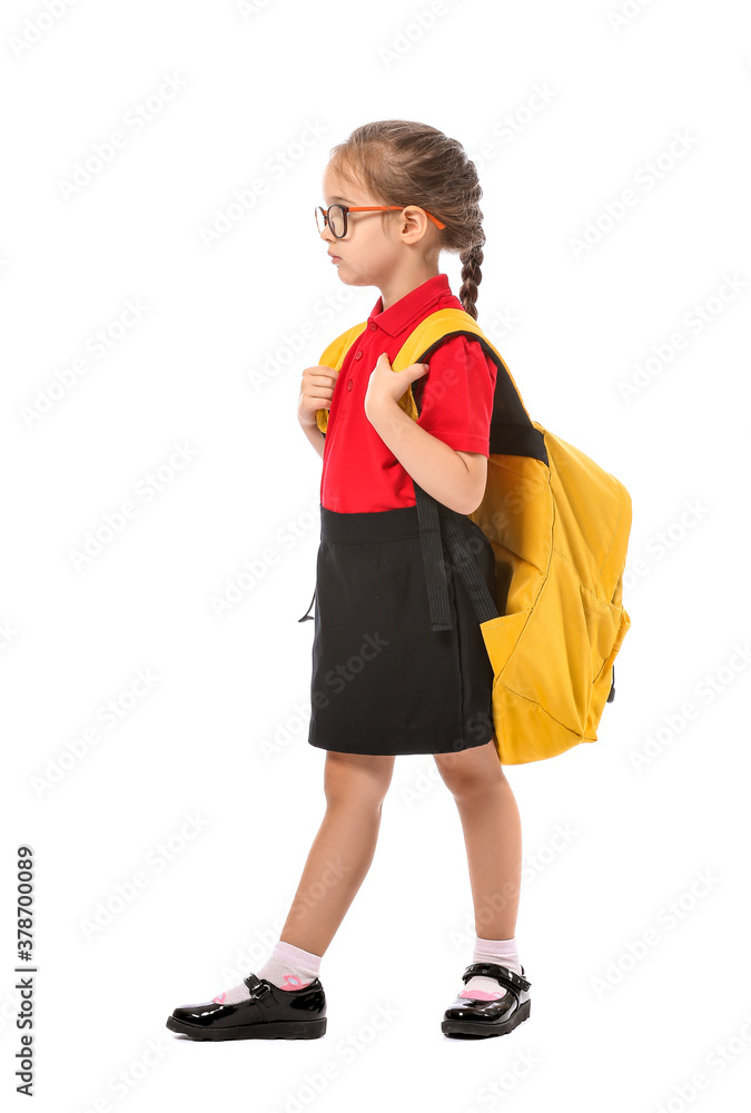 Little schoolgirl on white background