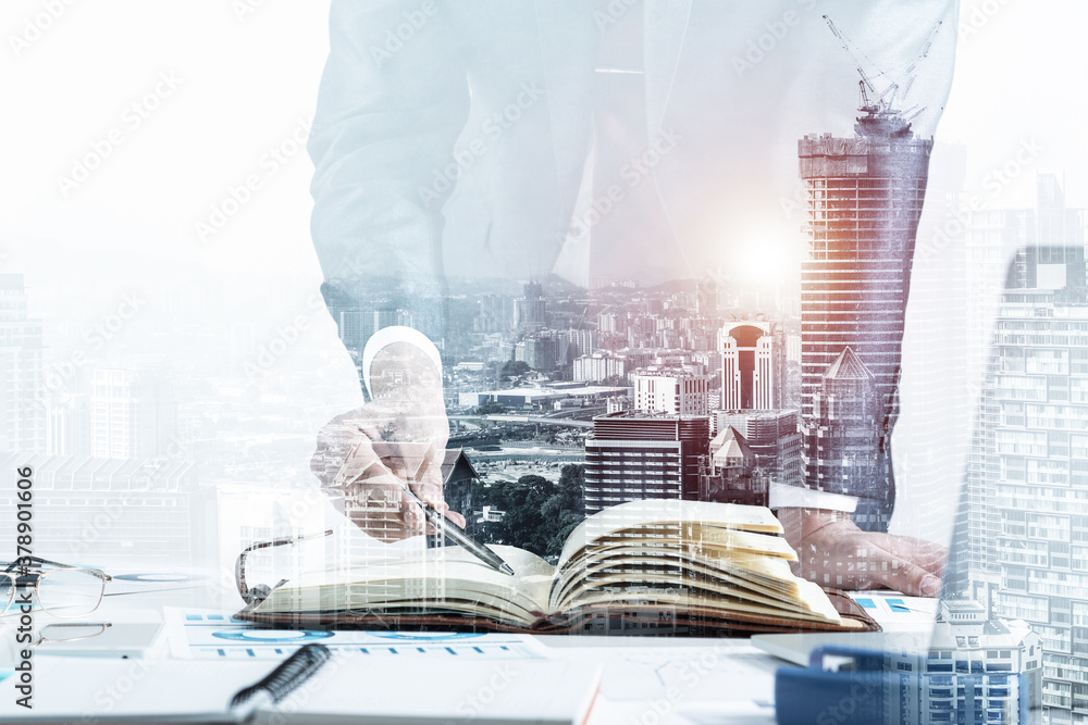 Businessman analyzing financial documents at desk