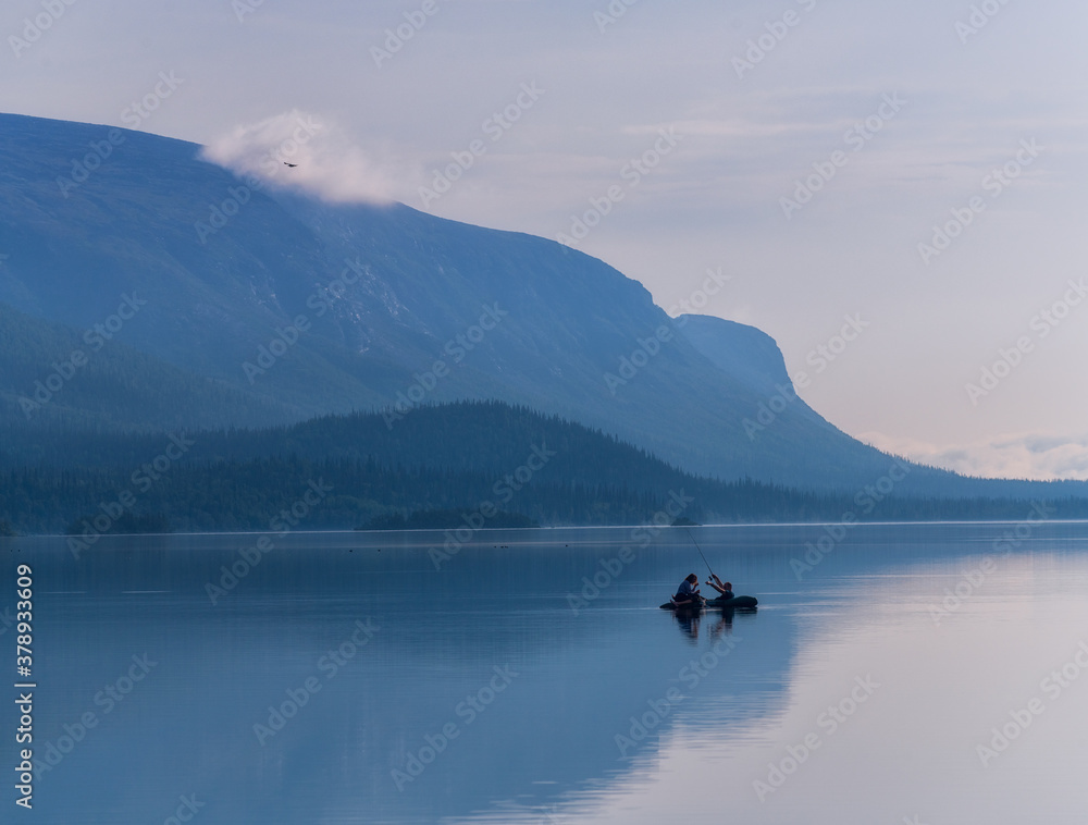 Fishing at dawn on Seidozero,Lovozerskie tundra, Russia.