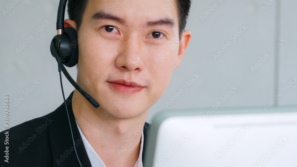 Business people wearing headset working in office to support remote customer or colleague. Call cent