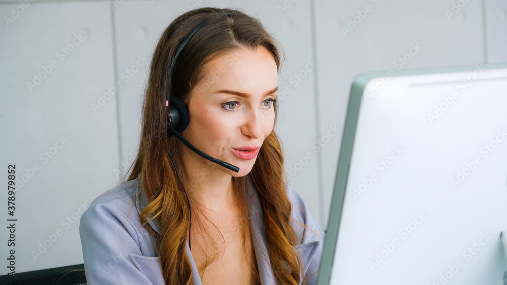 Business people wearing headset working in office to support remote customer or colleague. Call cent