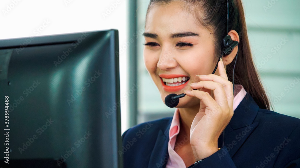 Business people wearing headset working in office to support remote customer or colleague. Call cent