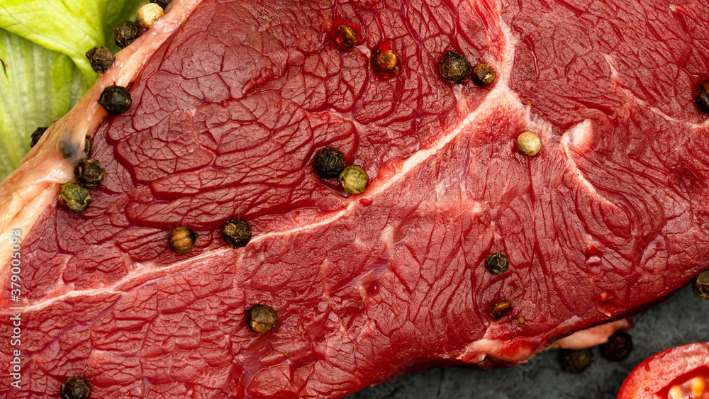 Steak striploin on a black background