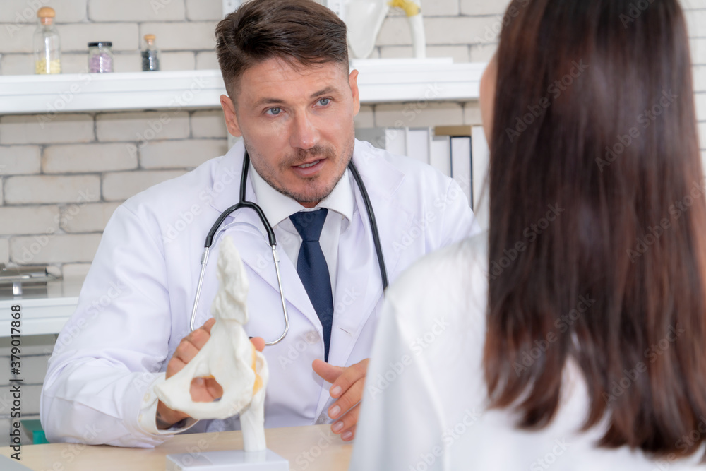 Doctor in professional uniform examining patient at hospital or medical clinic. Health care , medica