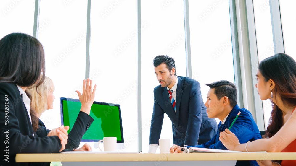 Business people in the conference room with green screen chroma key TV or computer on the office tab