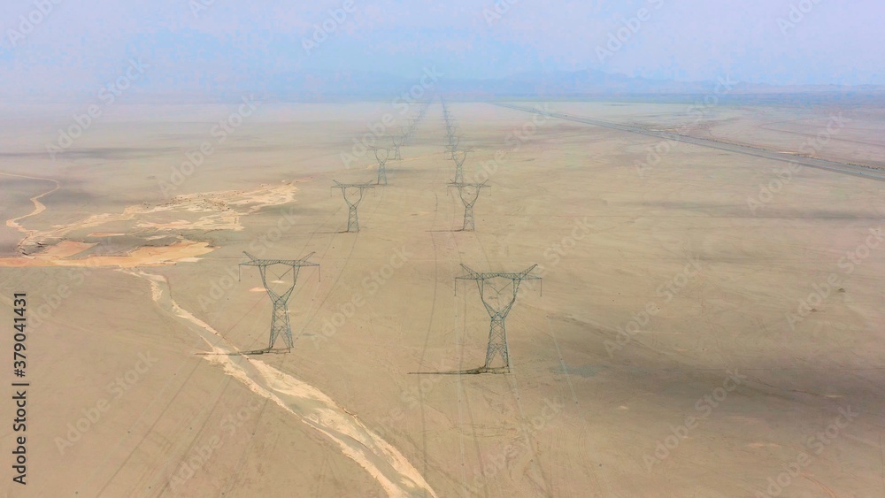 aerial view of telegraph pole in desert