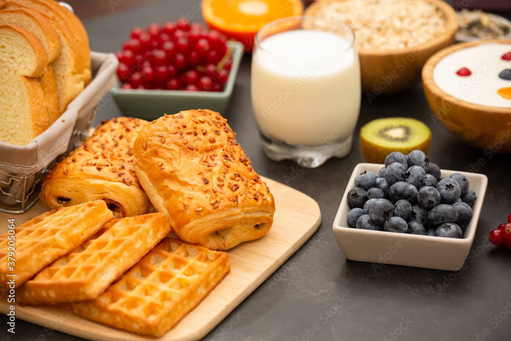 Breakfast Served in the morning with Butter bread and corn flakes Whole grains and raisins with milk