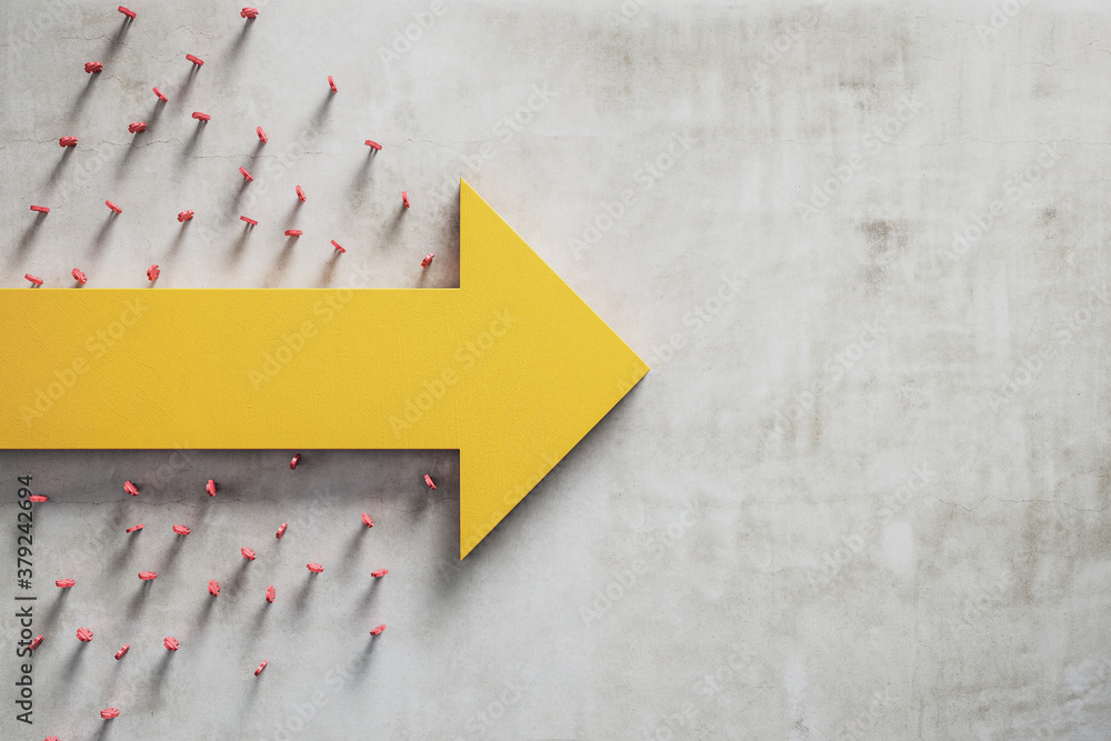 Yellow arrow with 3d people on concrete table.