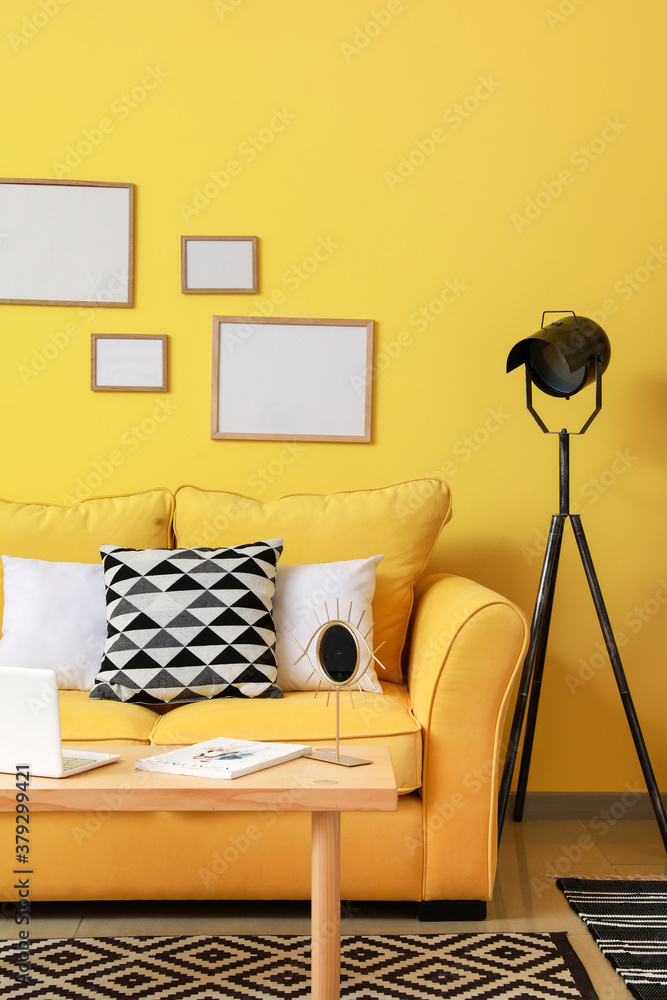 Interior of modern room with comfortable sofa