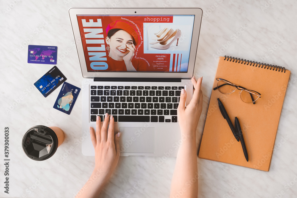 Young woman shopping online at home