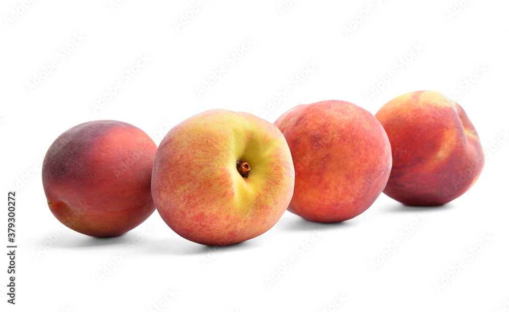 Sweet ripe peaches on white background