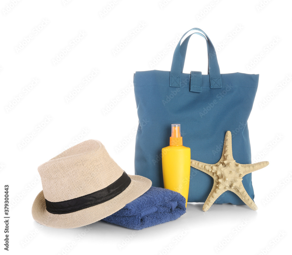 Set of beach accessories on white background