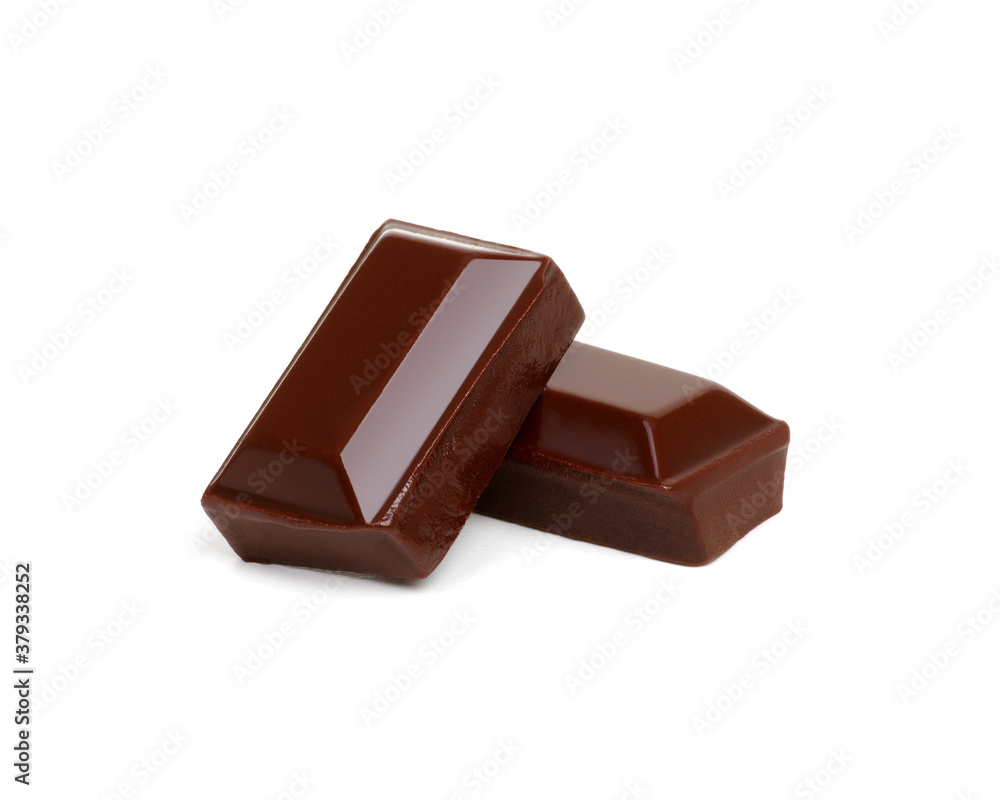 close up of chocolate pieces on white