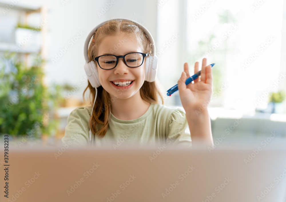 Girl doing homework or online education.