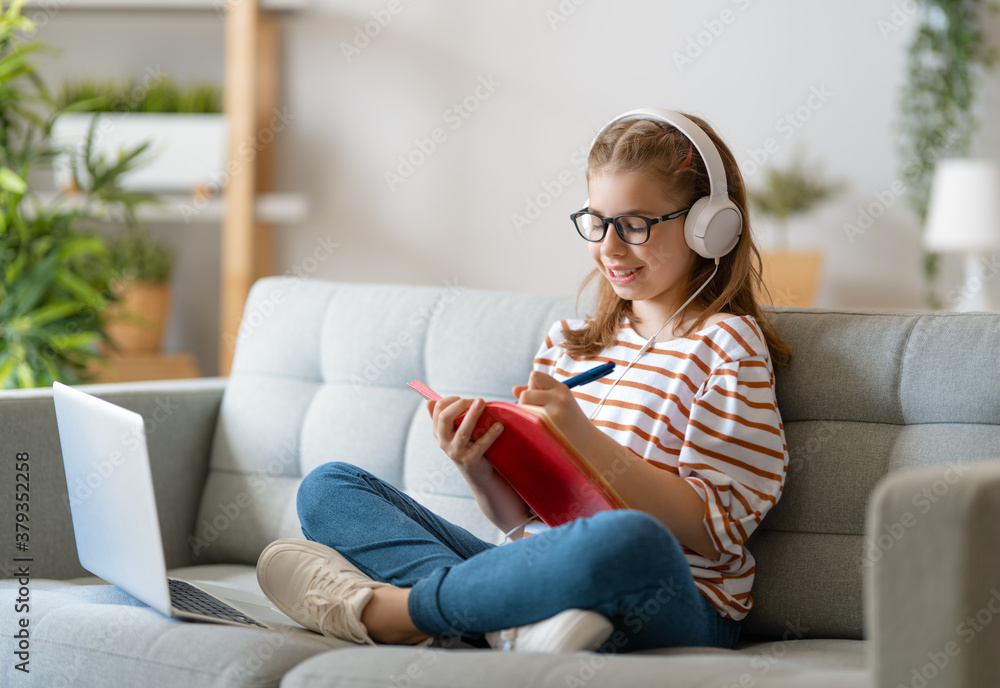 Girl doing homework or online education.