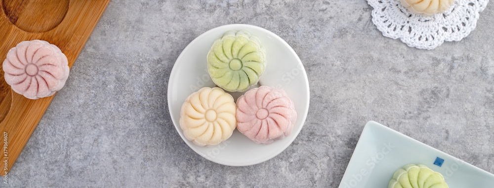 Colorful snow skin moon cake, sweet snowy mooncake, traditional savory dessert for Mid-Autumn Festiv